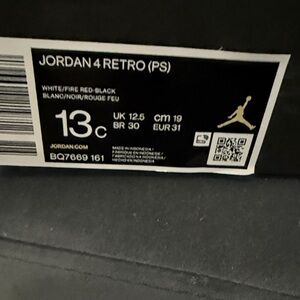 Jordan 4 Retro PS in White, Fire Red, and Black